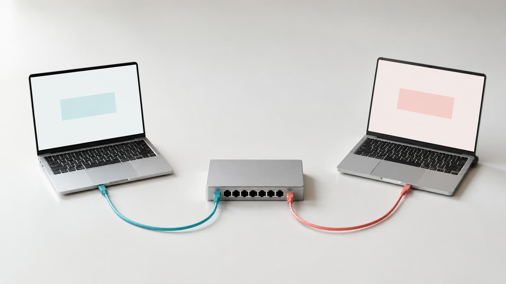 Illustration of two laptops, each connected by a separate cable to one small Ethernet switch.